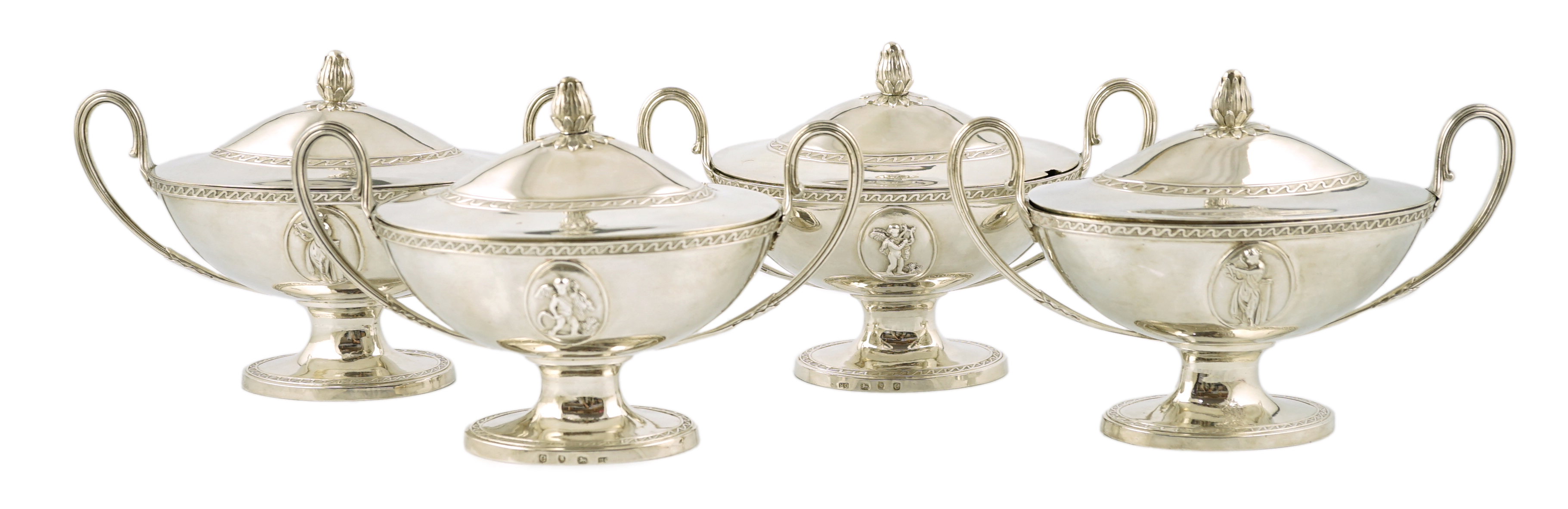 A good set of four George III silver oval pedestal sauce tureen's and covers